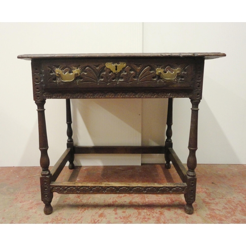 407 - 18th century oak side table with incised mouldings to the table top and frieze, iron lock to the dra... 