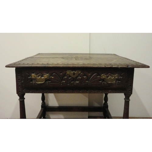 407 - 18th century oak side table with incised mouldings to the table top and frieze, iron lock to the dra... 