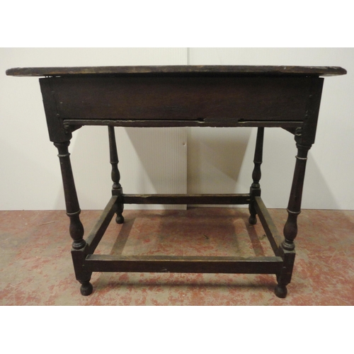 407 - 18th century oak side table with incised mouldings to the table top and frieze, iron lock to the dra... 