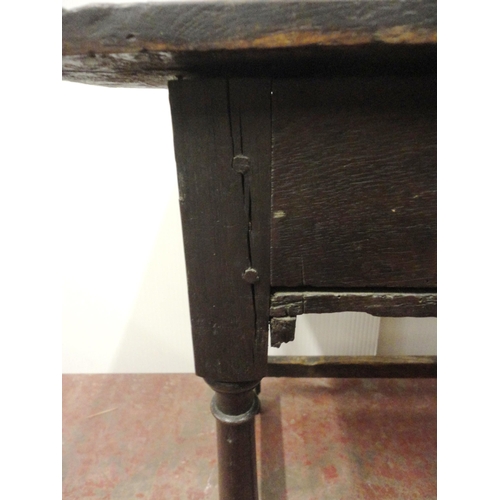 407 - 18th century oak side table with incised mouldings to the table top and frieze, iron lock to the dra... 