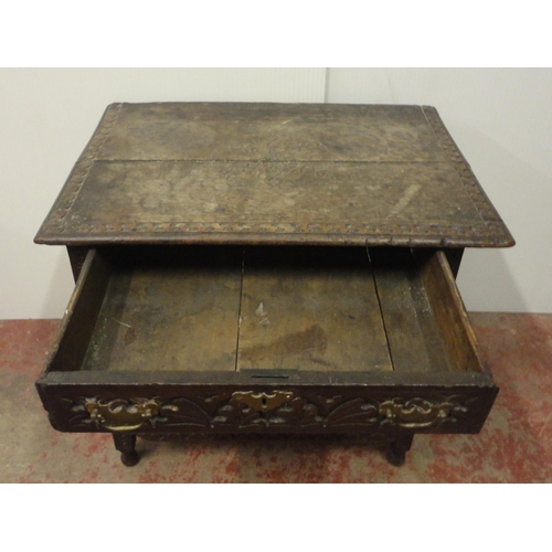 407 - 18th century oak side table with incised mouldings to the table top and frieze, iron lock to the dra... 