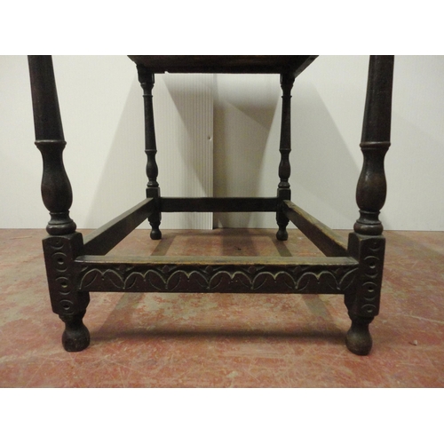 407 - 18th century oak side table with incised mouldings to the table top and frieze, iron lock to the dra... 