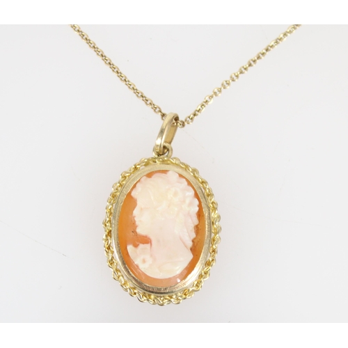 516 - 9ct gold framed cameo pendant on yellow metal chain, gross 5.0g.