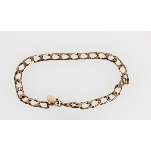 522 - 9ct gold curb link bracelet, 6.6g.