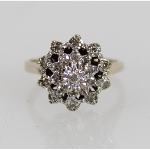 528 - 9ct gold and diamond ring, the 20 illusion set diamonds on tiered mount, 3.6g, size K/L