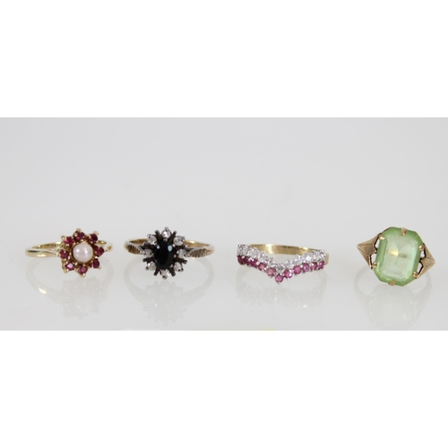 531 - Four stone set 9ct gold rings, gross 8.8g.