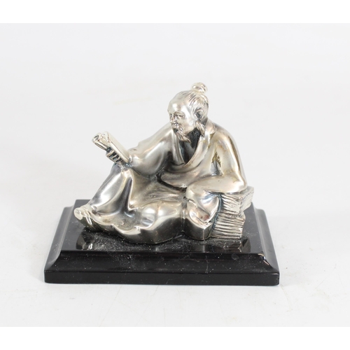 562 - Italian weighted silver model of a Japanese scholar on plinth base, H8cm.