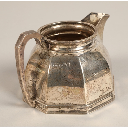 183 - Three piece silver tea service, comprising of teapot, cream jug and sugar bowl of octagonal tapered ... 