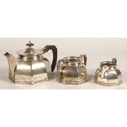 183 - Three piece silver tea service, comprising of teapot, cream jug and sugar bowl of octagonal tapered ... 