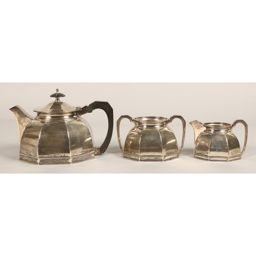 183 - Three piece silver tea service, comprising of teapot, cream jug and sugar bowl of octagonal tapered ... 