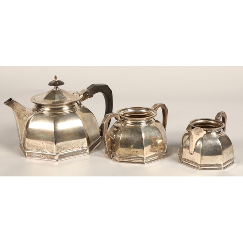 183 - Three piece silver tea service, comprising of teapot, cream jug and sugar bowl of octagonal tapered ... 