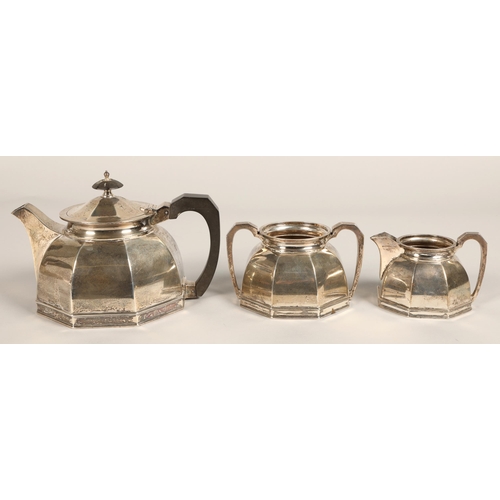 183 - Three piece silver tea service, comprising of teapot, cream jug and sugar bowl of octagonal tapered ... 