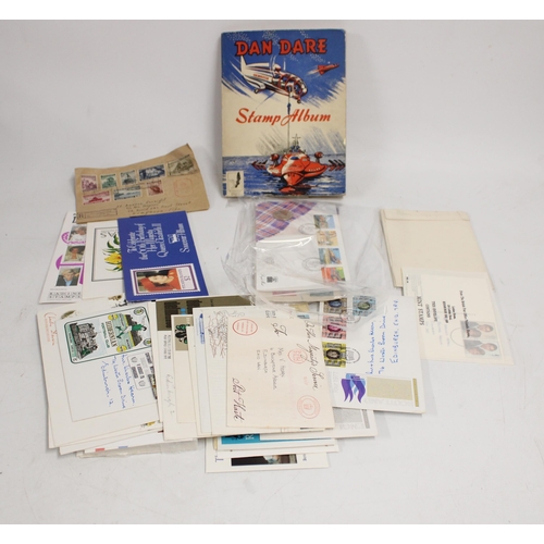 617 - Stamp collection to include a Dan Dare album of 20th century used stamps, covers to include Coronati... 