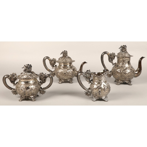 190 - Fantastic 19th century chinese silver four piece tea and coffee service, decorated with warriors, dr... 