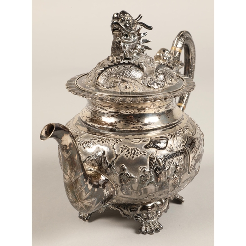 190 - Fantastic 19th century chinese silver four piece tea and coffee service, decorated with warriors, dr... 