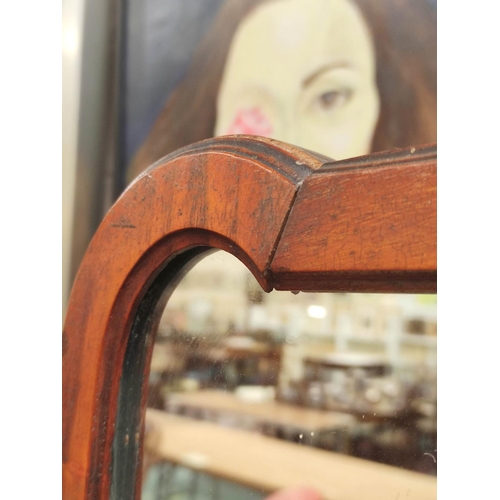 459 - Mahogany cheval mirror with shaped arched top, in the Queen Anne manner, upon reeded supports and sh... 