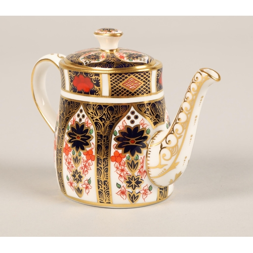 26 - Royal Crown Derby miniature tea service in the imari pattern, comprising of teapot, sugar bowl, crea... 