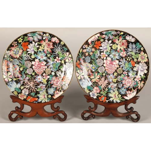 204 - Pair of Famille noire millefleur plates,each painted with a millefleur pattern on black ground, six ... 