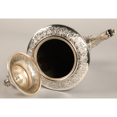 187 - Three piece silver plated tea service with embossed decoration.