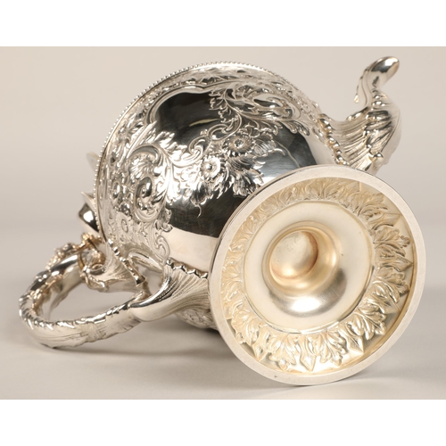 187 - Three piece silver plated tea service with embossed decoration.