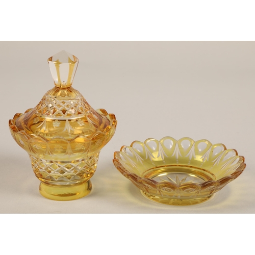 239 - Bohemian amber glass preserve jar, cover and saucer, 22cm high.