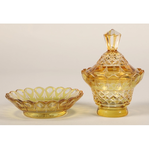 239 - Bohemian amber glass preserve jar, cover and saucer, 22cm high.