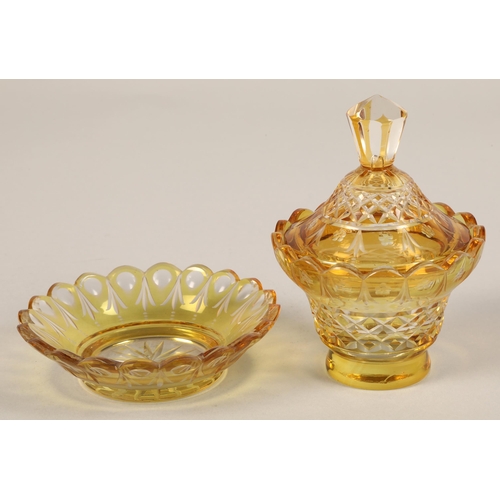 239 - Bohemian amber glass preserve jar, cover and saucer, 22cm high.