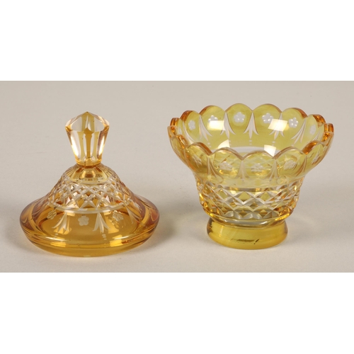 239 - Bohemian amber glass preserve jar, cover and saucer, 22cm high.