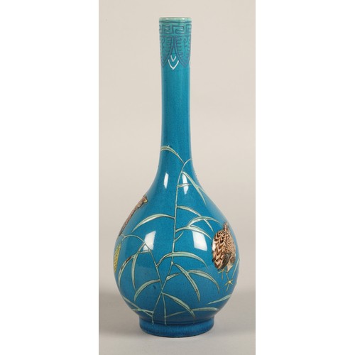 202 - Chinese bottle shaped vase, blue ground with two quail  amongst vines, 25cm high.