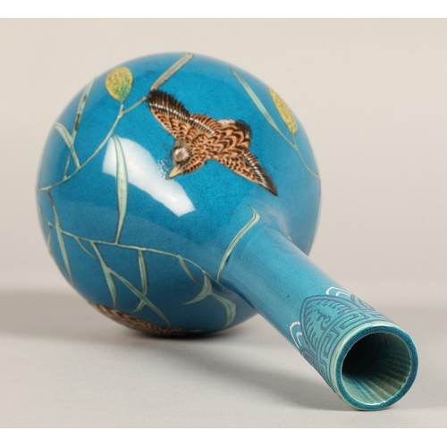 202 - Chinese bottle shaped vase, blue ground with two quail  amongst vines, 25cm high.