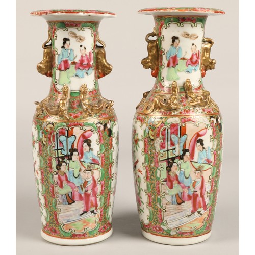 205 - Pair of Canton vases, of baluster form, with panels of figures, birds, butterflies and flowers, with... 