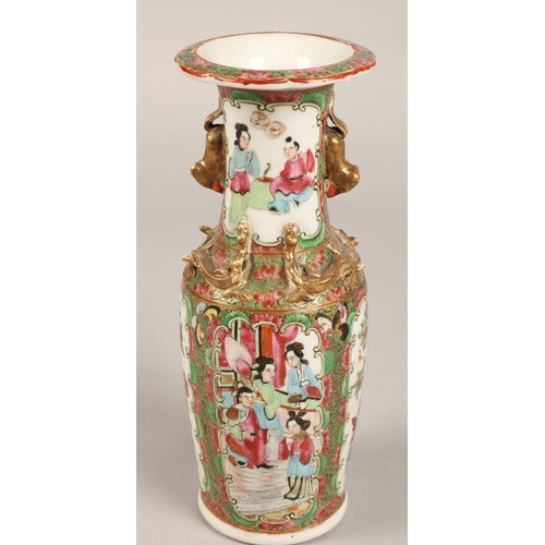 205 - Pair of Canton vases, of baluster form, with panels of figures, birds, butterflies and flowers, with... 