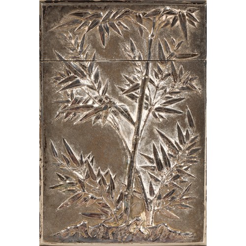 195 - Chinese silver embossed card case, embossed with a coiled dragon on one side and bamboo shoots to th... 