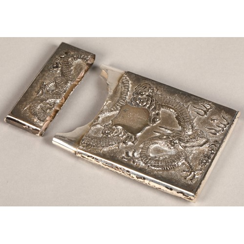 195 - Chinese silver embossed card case, embossed with a coiled dragon on one side and bamboo shoots to th... 