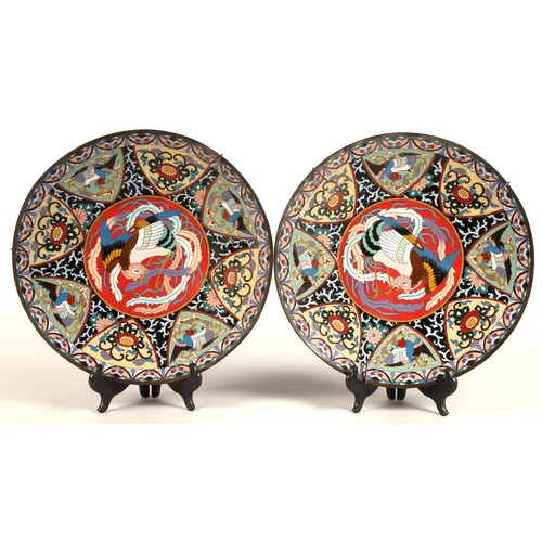 211 - Pair of Japanese cloisonne 19th century chargers, each with a central phoenix surrounded by eight pa... 