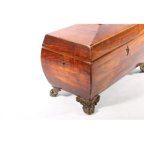 1 - 19th century rosewood tea caddy of sarcophagus shape on cast brass feet, 31cm wide.