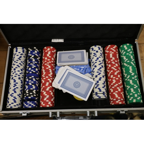 106 - Three aluminium cased poker chip sets and a poker playing board.