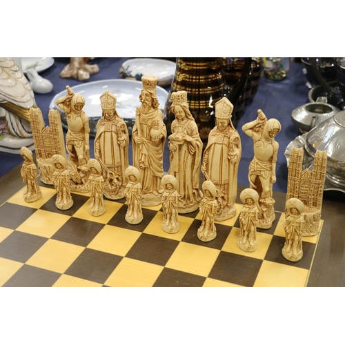 116 - Resin chess set with original board.