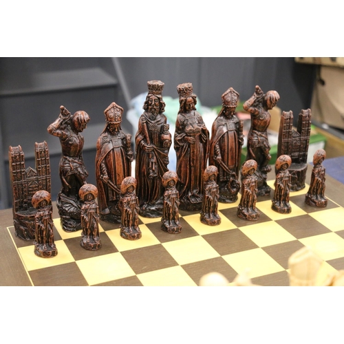 116 - Resin chess set with original board.