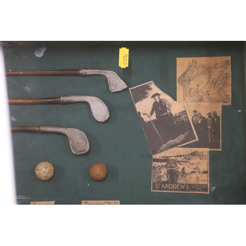 159 - History of golf collage to include models of golf clubs, golf balls, etc. 80cm.