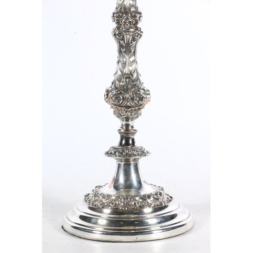 161 - Silver-plated table lamp base converted from a large candlestick, heavily decorated in rococo swirls... 