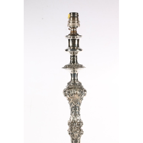 161 - Silver-plated table lamp base converted from a large candlestick, heavily decorated in rococo swirls... 