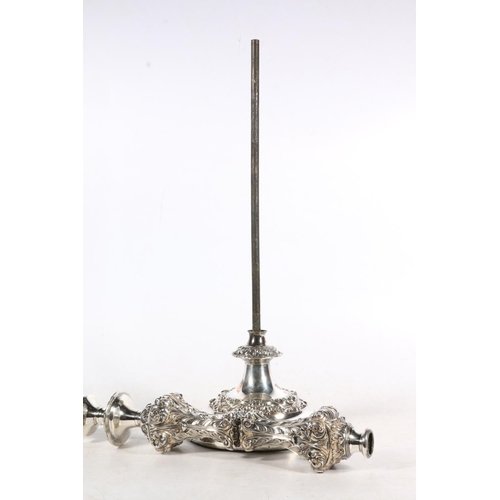 161 - Silver-plated table lamp base converted from a large candlestick, heavily decorated in rococo swirls... 