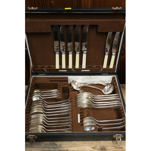 194 - Two canteens of silver-plated cutlery.