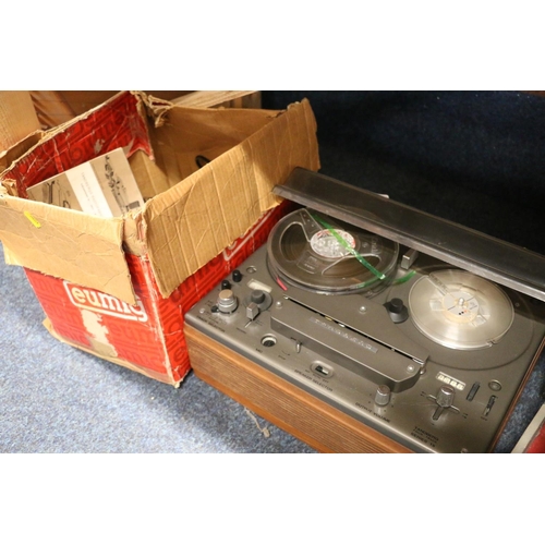 256 - Tandberg 4-track Series 15 reel-to-reel tape player and accessories, a Eumig MK709 standard & su... 