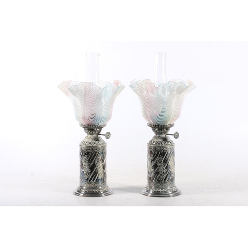 Pair of silver-plated paraffin lamps with coloured handkerchief glass ...