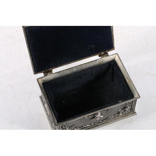 329 - Silver-plated trinket box decorated with cherubs and roses.