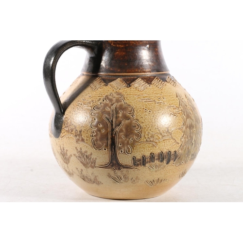 336 - German Studio Pottery stoneware jug with incised cabin and trees scene, mark to base, 16cm high.