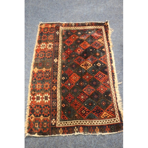 750 - Persian Afghan bag face saddlebag type rug, 120cm x 77cm