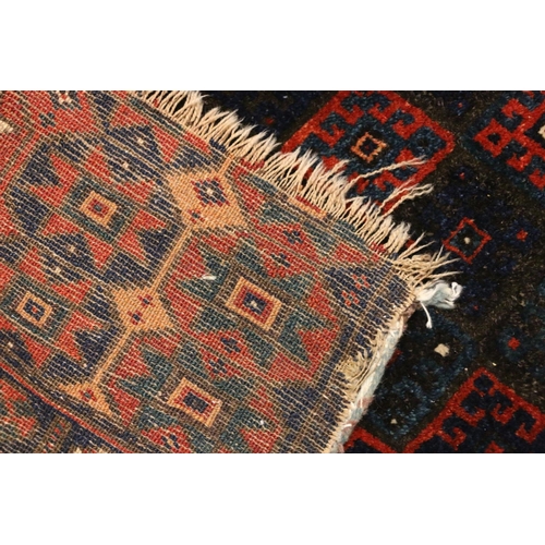 750 - Persian Afghan bag face saddlebag type rug, 120cm x 77cm